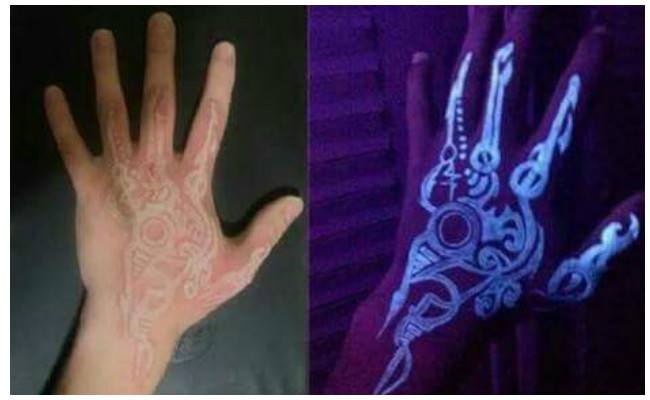 Tatuajes fluorescentes en los brazos